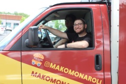 Photo of food truck driver smiling